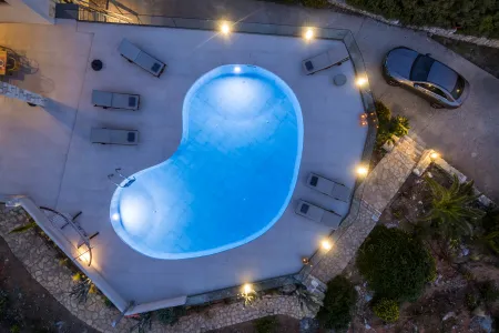  pool night drone view