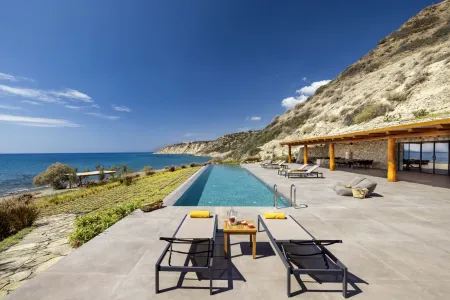  Various seating areas near infinity pool overlooking the sea