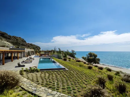 Terrace with pool and coastline view