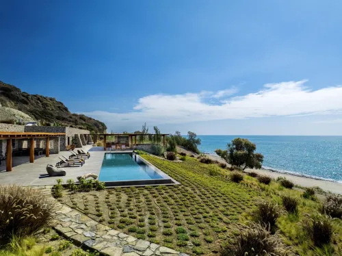 Terrace with pool and coastline view