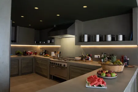  Kitchen with stove, pans, and cookware