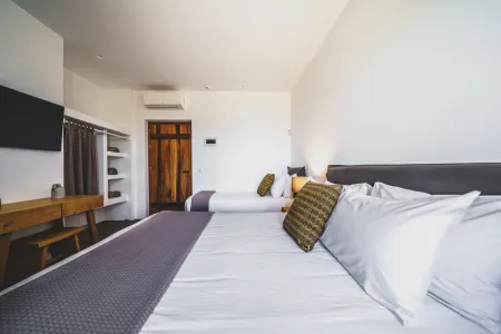  Single beds and wardrobe near room entrance