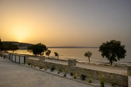 beachfront villa at sunset