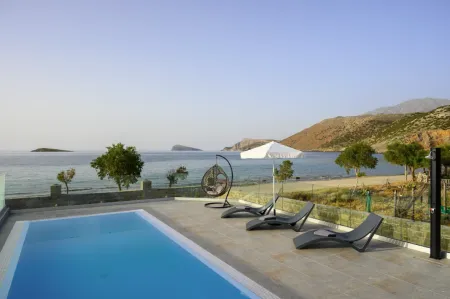  swimming pool in font of beach