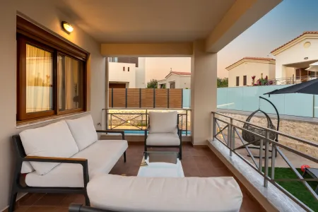   outdoor sitting area near the pool