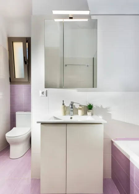  Sleek designed bathroom with toilet and bath tub